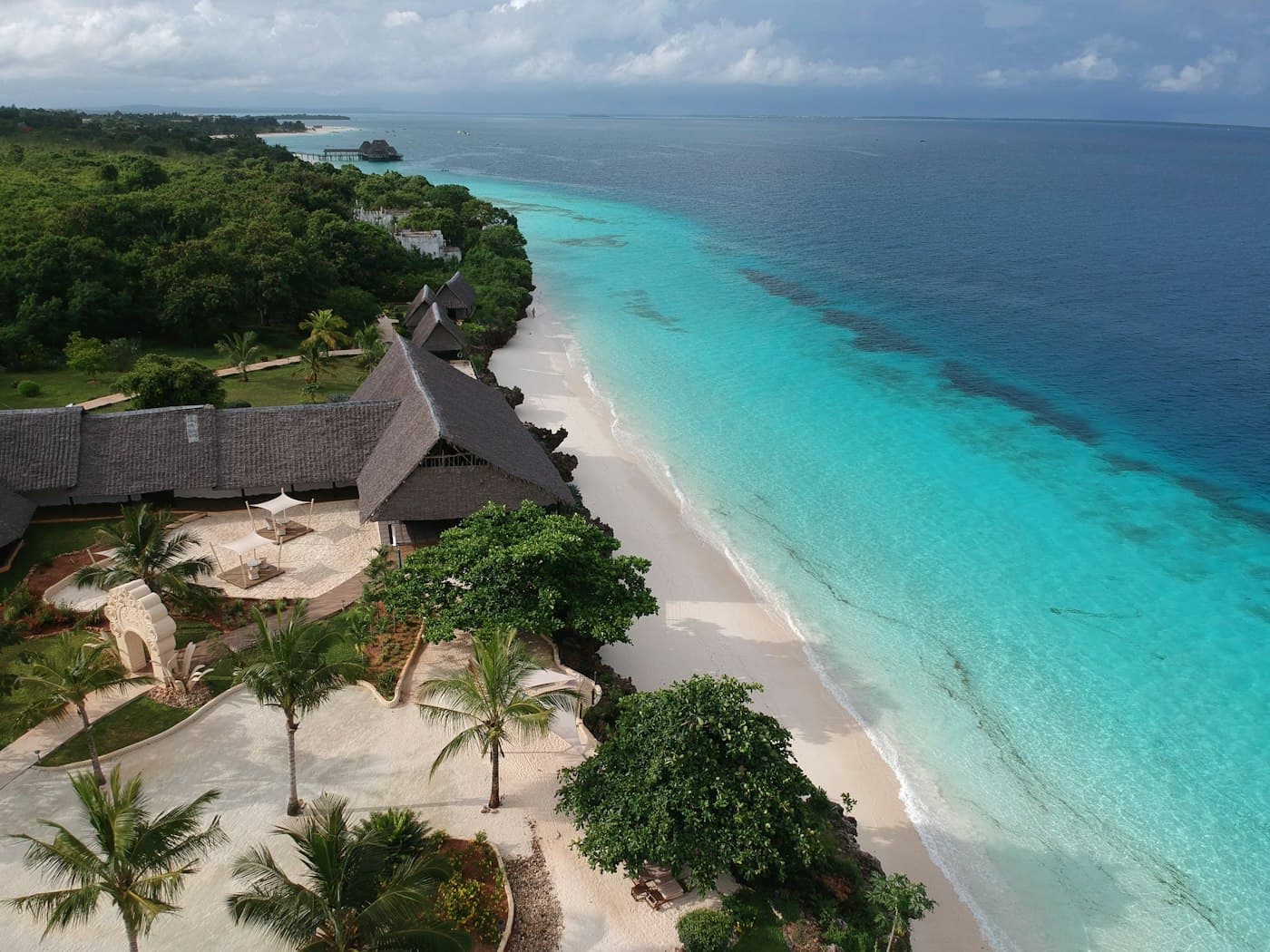 Aerial view of Diani's turquoise water and white sand beach